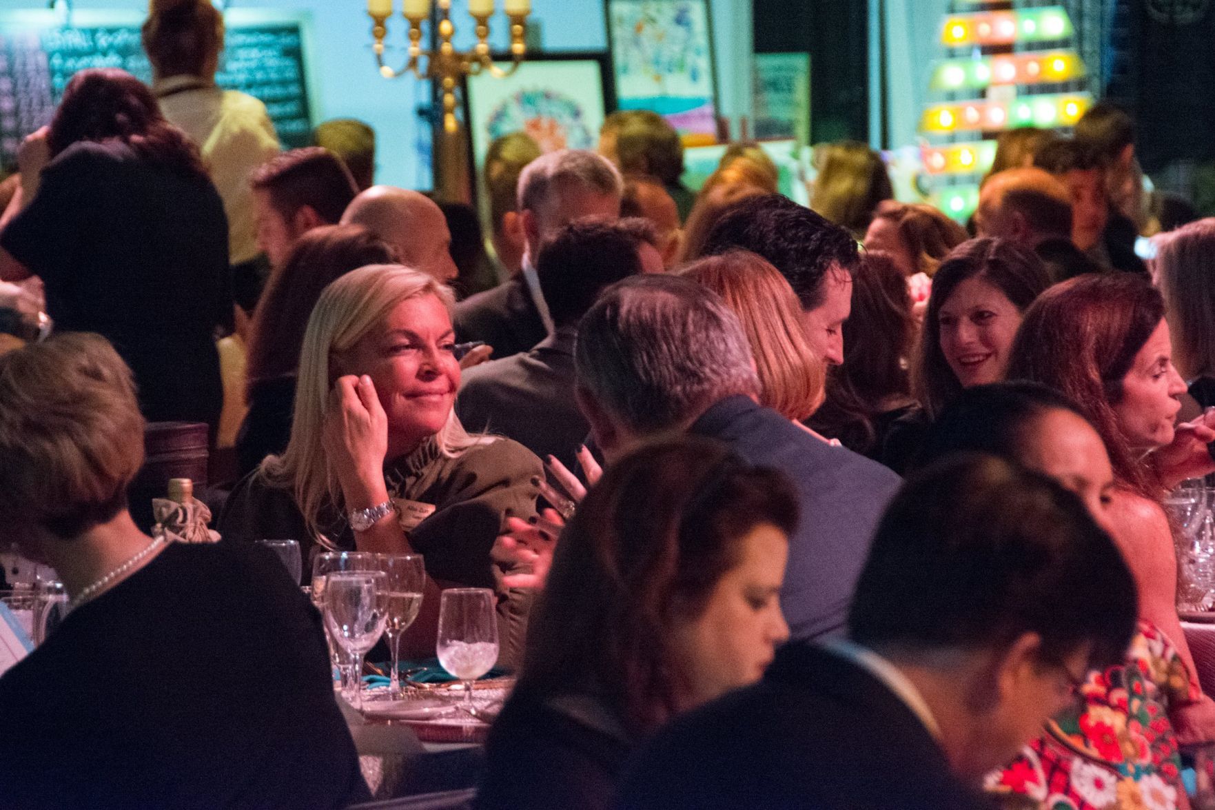 Guests chat over dinner